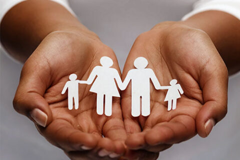 Happy family protected by insurance
